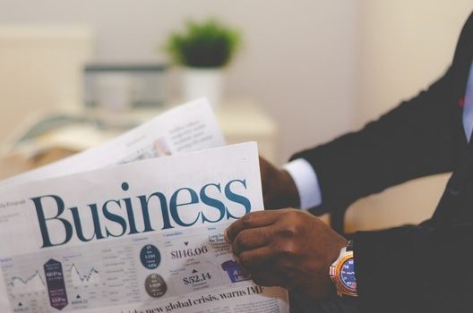 Business man with newspaper